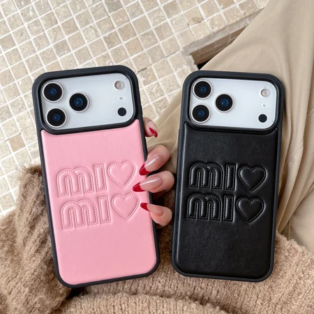 Miu Miu iphone17/17promaxケース エンボスレザー ハートロゴ 可愛い ピンク ブラック 男女ペア
