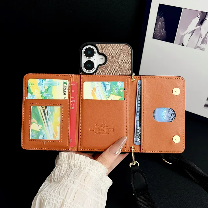 Coach iphone16eケース ストラップ付き
