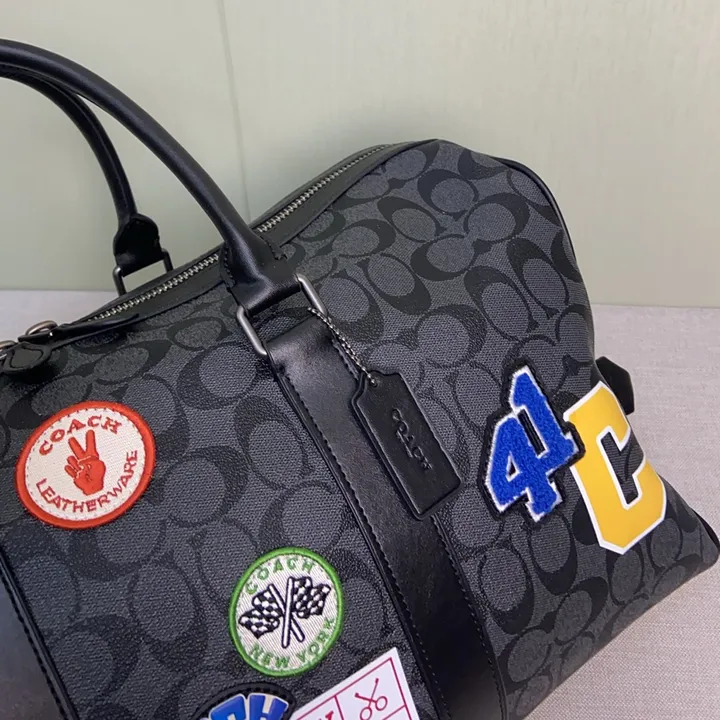 COACH シグネチャー キャンバス ボストンバッグ