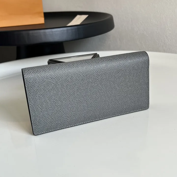 ルイヴィトン 二つ折り長財布 M81554