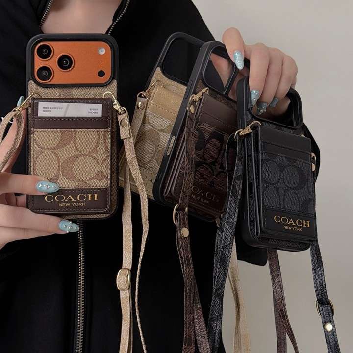 コーチ 落下防止 ストラップ付き スマホケース