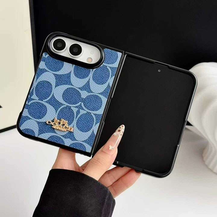 コーチ アイフォーン デュオ スマホケース レンズ保護
